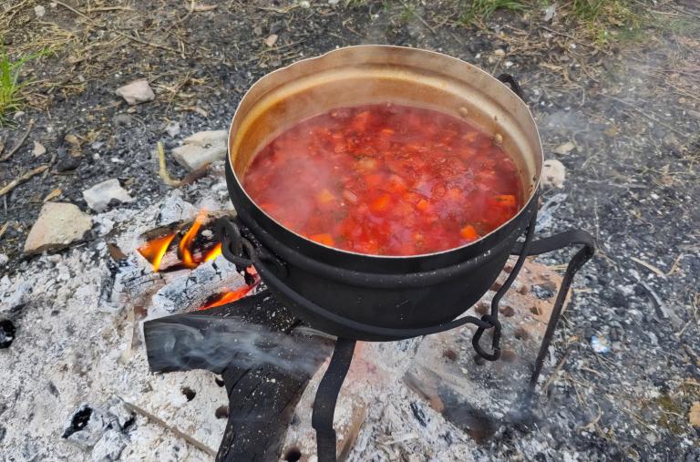 Cooking Borscht at the camp fire.